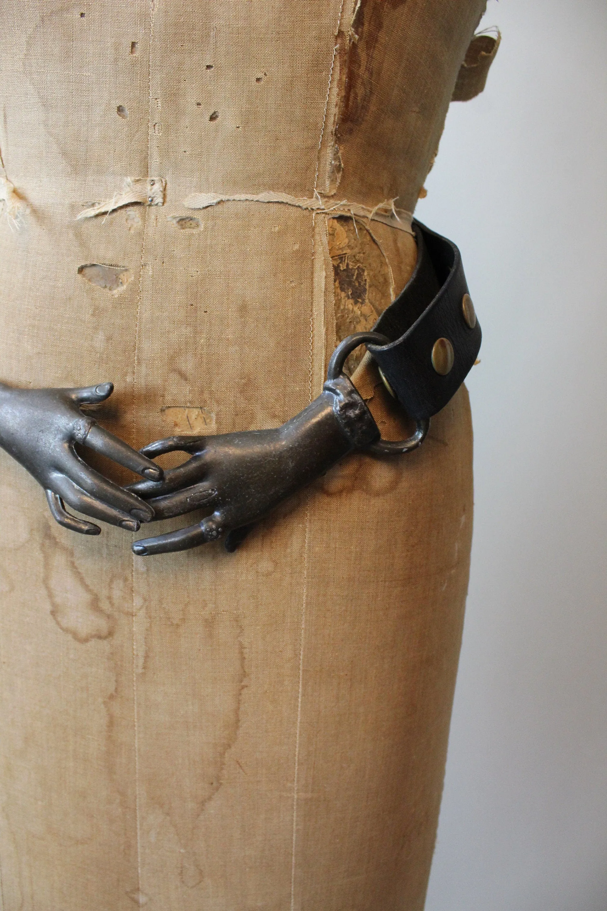 1970s SURREALIST black bronze CLASPED HANDS belt | new fall winter